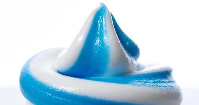 Toothpaste Squeezing From Tube On White Background Close Up