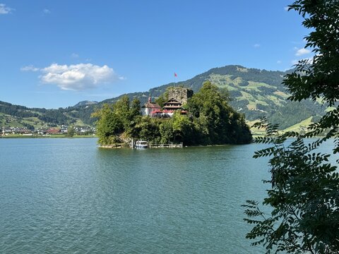 Historic Schwanau Island on Lake Lauerz Surrounded by Swiss Mountains