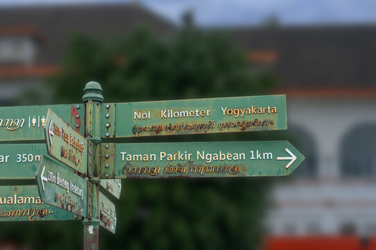 Directional Signboard at Yogyakarta Zero Kilometer Point with Blurred Background