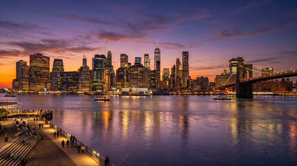 Fototapeta premium A serene cityscape at dusk with a waterfront promenade and iconic bridge