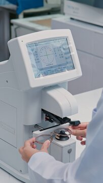 The optometrist uses an auto lensmeter