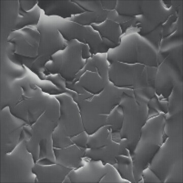 A scanning electron microscopy image of cracked surface showing damaged material texture.