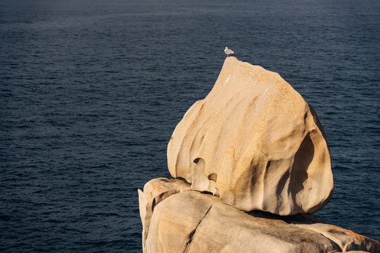 Granite rock formations in the Cliffs of Paper in San Ciprian, Lugo, Galicia, Spain.