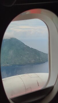 a view after takeoff on a airplane from ternate island