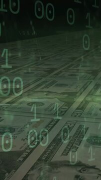 Vertical video: On playback green binary scrolling over US bills, light sweeping, showing finance