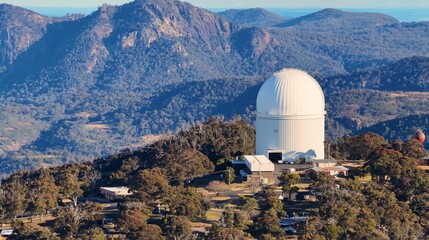 Fototapeta premium Aerial View of Large White Observatory Dome in Rugged Australian Mountains