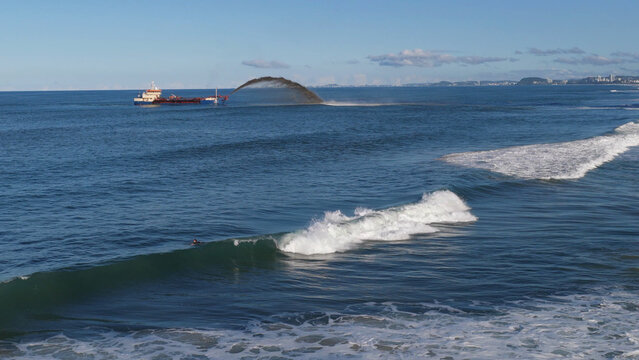 Dredging Ship Pumping Sand into the Ocean at Gold Coast Australia