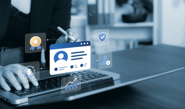 Customer retention concept with loyalty badge, secure profile, revenue and renewal icons on virtual interface above laptop, representing membership management, customer value and business growth.
