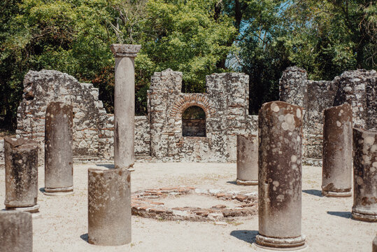 Ancient baptistery ruins with stone columns in Butrint, Albania
