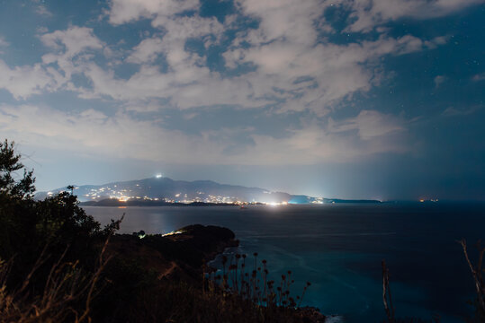 Night view over Corfu island from Ksamil on the Albanian Riviera