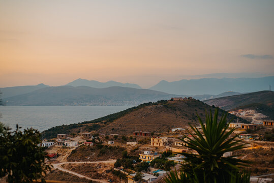 Evening view over coastal hills and Monastery of St. George in Albania