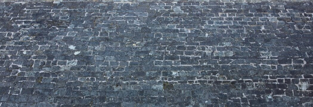 Close-up of weathered granite cobblestone texture, Saaremaa, Estonia, Europe.