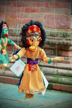 Traditional Nepalese String Puppet of Hindu Deity Lord Ganesha, Handmade Newari Marionette Souvenir and Cultural Art from Kathmandu Valley, Nepal