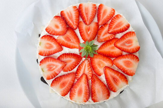 Garnished strawberry cream cheese tart, elevated view