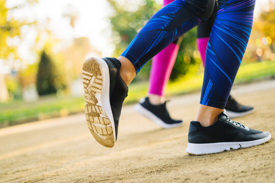 Close-up of two running women