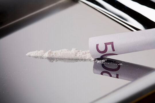 Cocaine inhaled with five hundred euro note, close-up