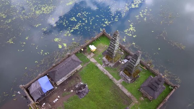 Aerial view of Pura Ulun Danu Tamblingan temple on the lake, Bali, Indonesia