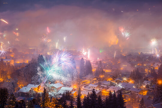 Germany, Bavaria, Oberstdorf, Fireworks at New Year's Eve