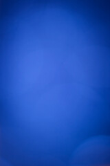 Fototapeta premium Blue abstract background with light bokeh effect
