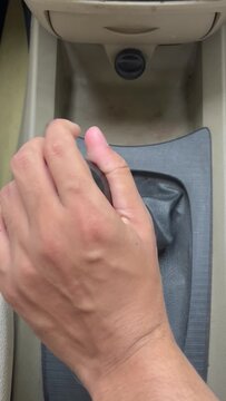 A detailed close-up video showing a driver's hand sequentially shifting a manual gear stick from neutral up to 5th gear.