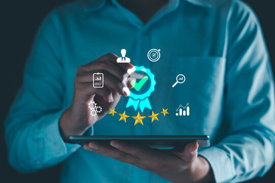 Businessman with digital quality assurance and five star rating. quality management TQM, ISO certification compliance, top performance control, business standard. service excellent satisfaction