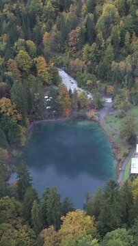 Vertical Aerial View of Blausee Lake Switzerland