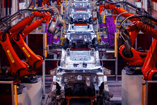 robotic arms on automated car production lines