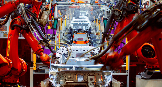 robotic arms on automated car production lines