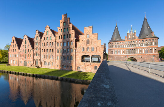 Historic warehouses and Holstein Gate, medieval landmarks at L&uuml;beck, Germany