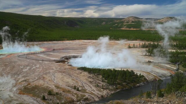 Elevated overlook trail Grand Prismatic Springs Overlook Midway Boardwalk Trail Firehole River largest hot springs steaming pool Mid Geyser Basin Wyoming Yellowstone National Park tourist attraction
