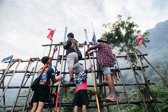 &ldquo;Traditional Boun Bang Fai rocket festival celebration in Vang Vieng, Laos, featuring homemade rocket launches, local culture, colorful festivities, and authentic Southeast Asian community traditions.