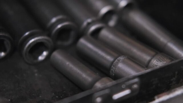 Close Up of Black Industrial Impact Socket Set organized in a Toolkit Drawer