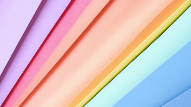 Different colors of paper are arranged in stripes on a flat surface, suitable for arts, crafts, and design projects
