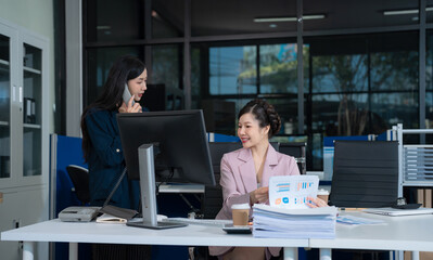 Fototapeta premium business people collaborate on project analysis with financial graphs. Strategic teamwork and insights drive company growth and success.