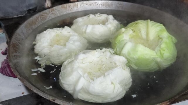 boiled cabbage is cooked in a pan