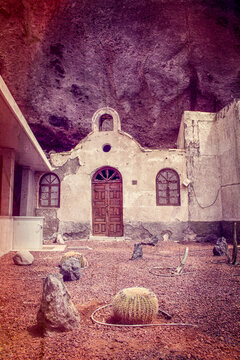 Tenerife, Canary Islands, Spain: an abandoned church on the pebble and black-sand beach of Playa de Los Roques in Los Roques de Fasnia coastal village 