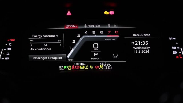 Hybrid car digital display panel. Starting car engine. Tachometer Gauge of Starting and Stopping Car. Many different car dashboard lights illuminated. Petrol meter on black background