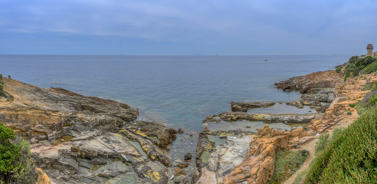 A panoramic view of the cliffs and rocks close to Boccale castle on the sea near Livorno in Tuscany region