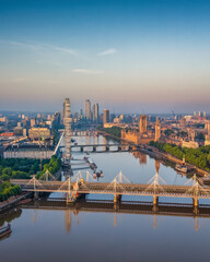 Obraz premium Panoramic aerial view of the skyline of London, England, with Southbank and Embankment, Westminster Palace back to Nine Elms during summer sunrise