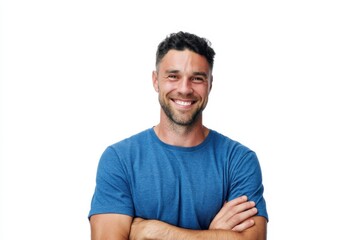 Fototapeta premium The Smiling Man in Blue T-Shirt Standing with Arms Crossed and Friendly Expression