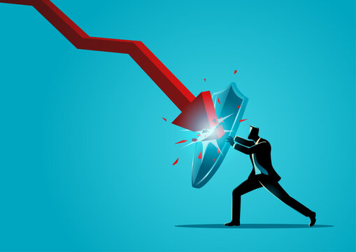 Businessman in a heroic pose defending against a financial crisis arrow with a giant shield concept