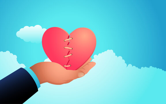 Hand holding stitched broken heart, emotional healing concept