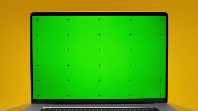 Laptop Green Screen Reveal Mockup on Yellow Background
