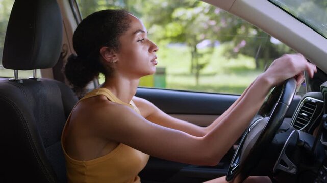 Tired stressed African American business woman sitting inside car hard work day exhausted female businesswoman girl problems fatigue crisis driver in vehicle transport auto rental difficulties burnout