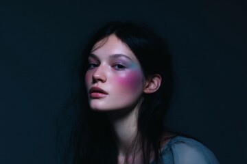 Naklejka premium Asymmetric magenta turquoise beauty editorial portrait with iridescent cheek color for makeup editorial and fashion background