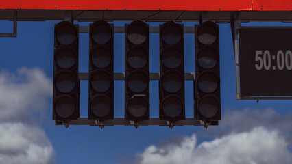 Fototapeta premium Motorsport starting lights on a speed circuit. Car racing. Competition. Graphic resource