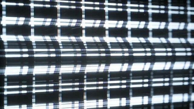 Refreshing pixel matrix showing flicker, lateral scanning, subpixel strips and banding in dark room