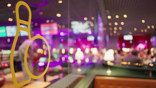 Neonlit lively game space. Reflective glass featuring energetic gaming scene with neon highlights