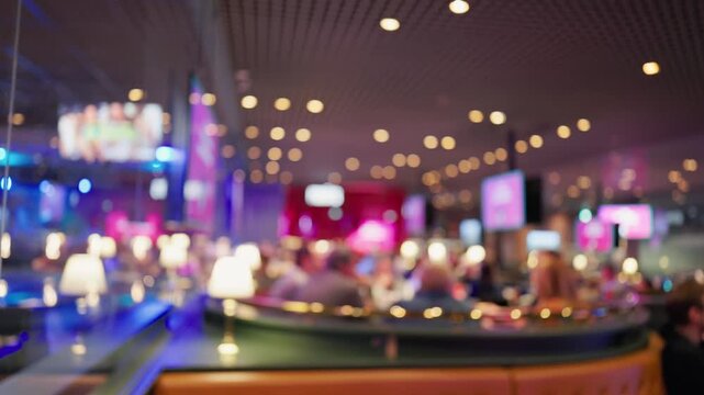 Vibrant restaurant with moving servers. Lively eatery filled with warm tones and busy activity