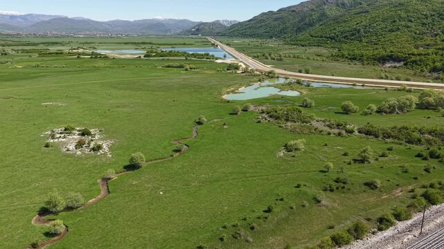Aerial View of Dam and Outflow Canal of Slano Lake, Water Reservoir Near Niksic, Montenegro